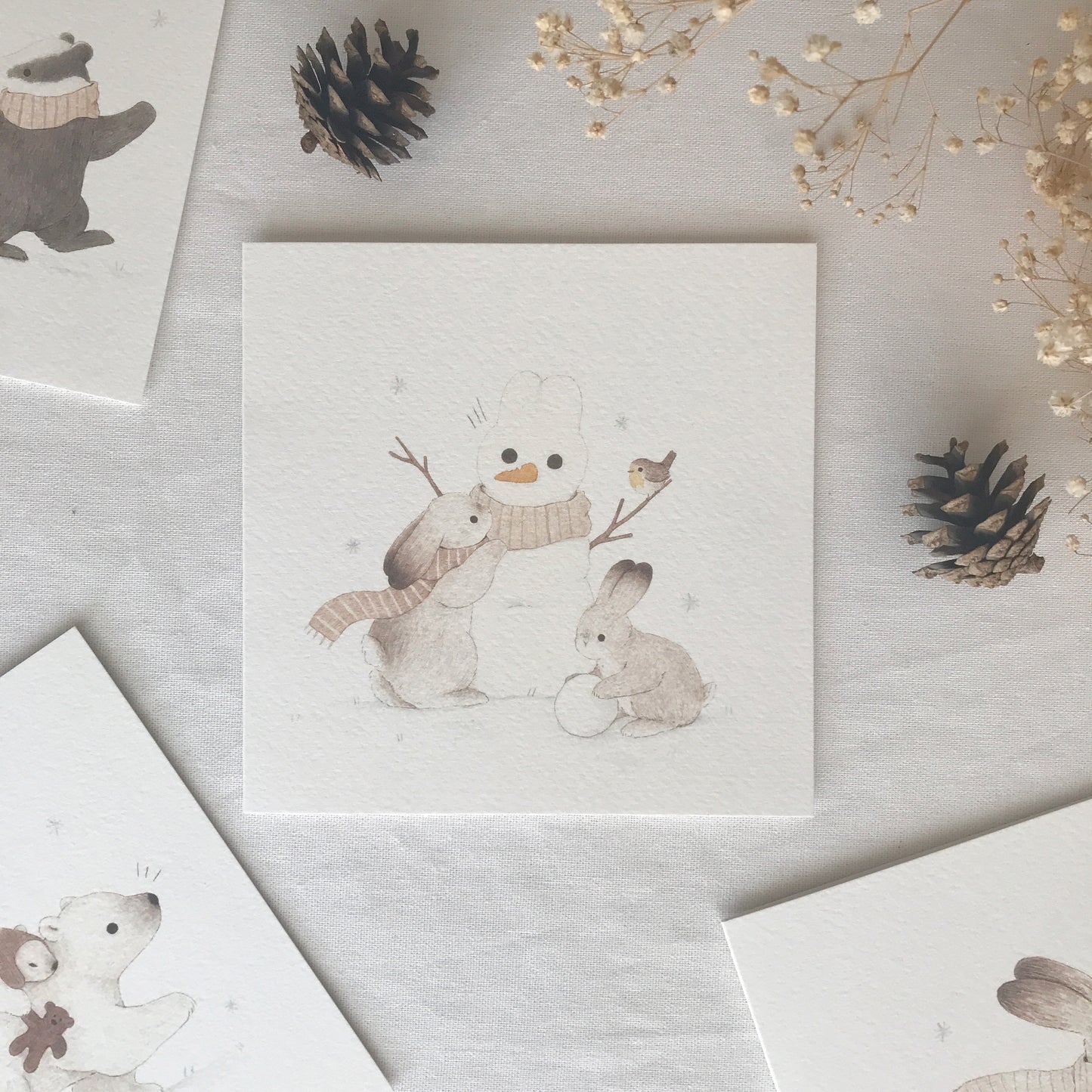 Snowman and Rabbits Christmas Greeting Card