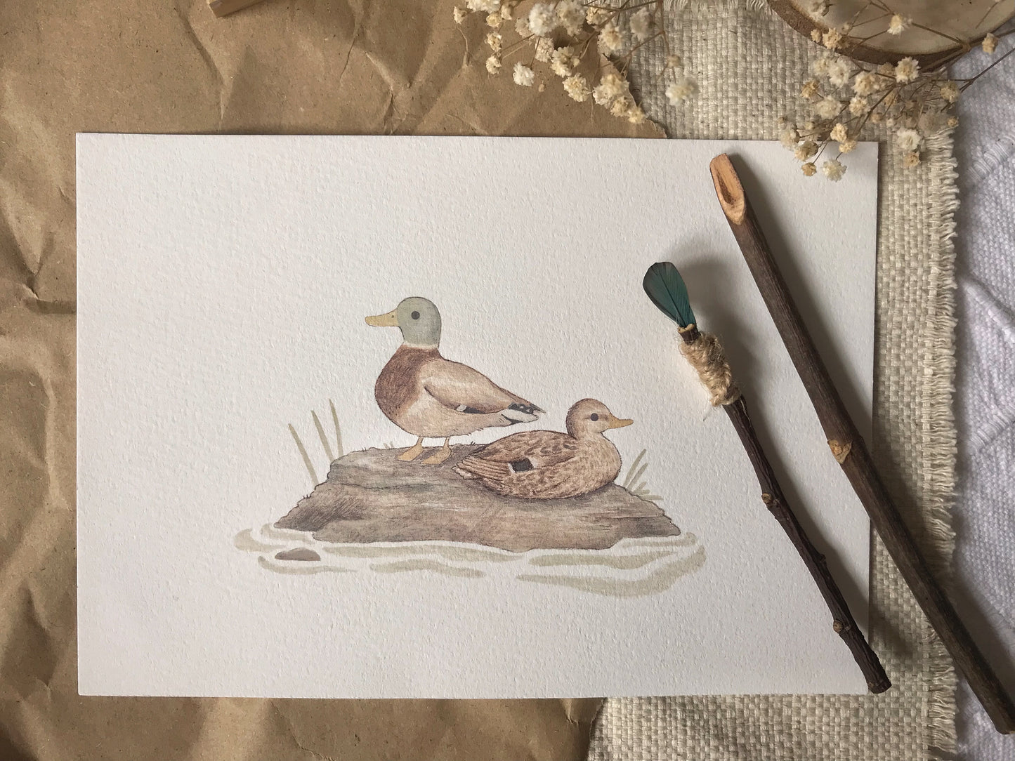 Mallard Duck Art Print in a nursery setting, featuring ducks resting on a rock in a calm woodland pond.
