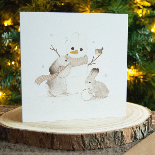 Snowman and Rabbits Christmas Greeting Card