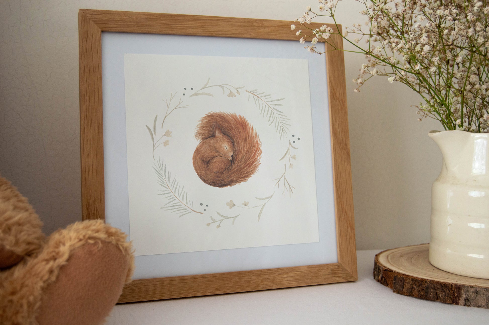 Sleeping Squirrel Nursery Art Print featuring a peaceful squirrel in a woodland setting